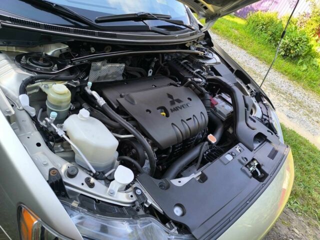 Бежевый Мицубиси Лансер, объемом двигателя 2 л и пробегом 100 тыс. км за 8000 $, фото 4 на Automoto.ua