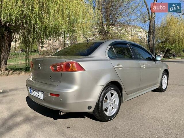 Бежевий Міцубісі Lancer, об'ємом двигуна 2 л та пробігом 175 тис. км за 7650 $, фото 5 на Automoto.ua