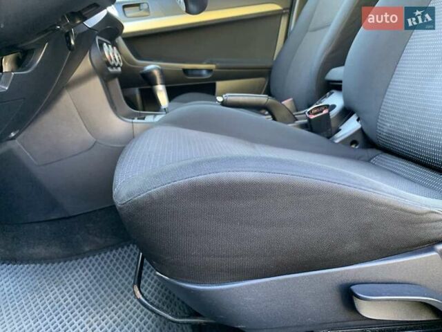 Бежевий Міцубісі Lancer, об'ємом двигуна 2 л та пробігом 175 тис. км за 7650 $, фото 22 на Automoto.ua
