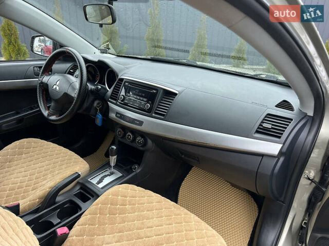 Бежевий Міцубісі Lancer, об'ємом двигуна 1.5 л та пробігом 245 тис. км за 6499 $, фото 13 на Automoto.ua