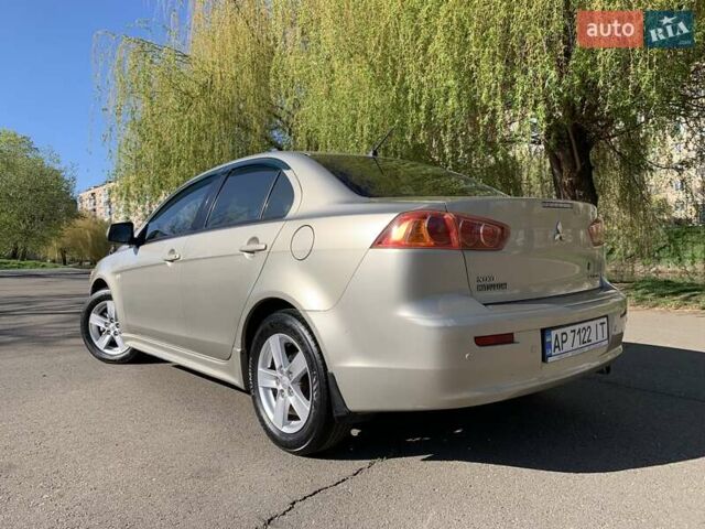 Бежевий Міцубісі Lancer, об'ємом двигуна 2 л та пробігом 175 тис. км за 7650 $, фото 10 на Automoto.ua