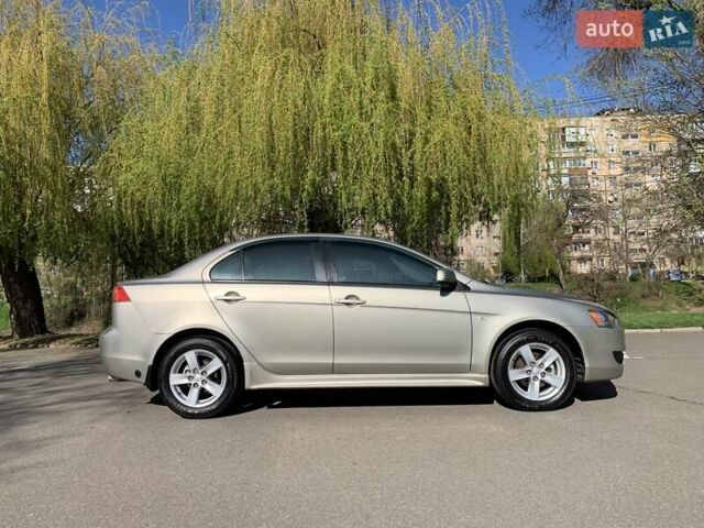 Бежевий Міцубісі Lancer, об'ємом двигуна 2 л та пробігом 175 тис. км за 7650 $, фото 4 на Automoto.ua