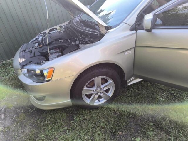 Бежевый Мицубиси Лансер, объемом двигателя 2 л и пробегом 100 тыс. км за 8000 $, фото 3 на Automoto.ua