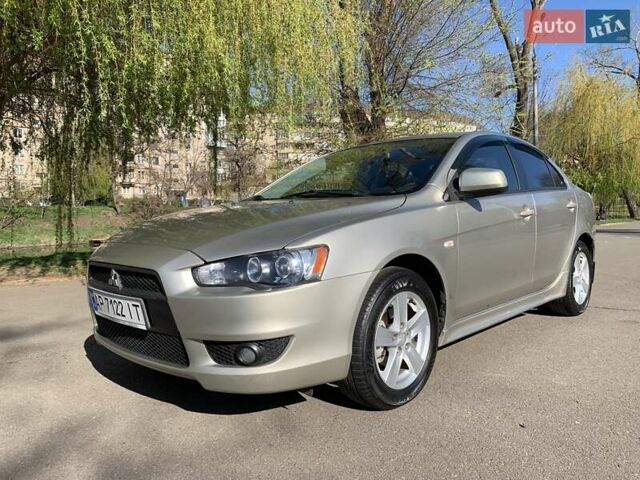 Бежевий Міцубісі Lancer, об'ємом двигуна 2 л та пробігом 175 тис. км за 7650 $, фото 1 на Automoto.ua