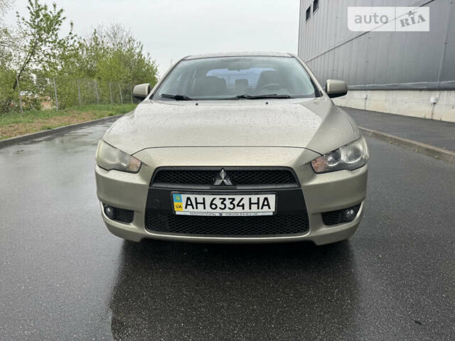 Бежевий Міцубісі Lancer, об'ємом двигуна 2 л та пробігом 240 тис. км за 6500 $, фото 23 на Automoto.ua