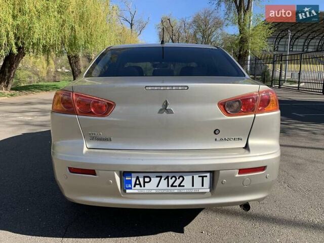 Бежевий Міцубісі Lancer, об'ємом двигуна 2 л та пробігом 175 тис. км за 7650 $, фото 6 на Automoto.ua