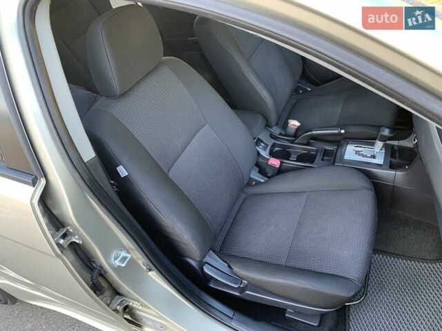 Бежевий Міцубісі Lancer, об'ємом двигуна 2 л та пробігом 175 тис. км за 7650 $, фото 30 на Automoto.ua