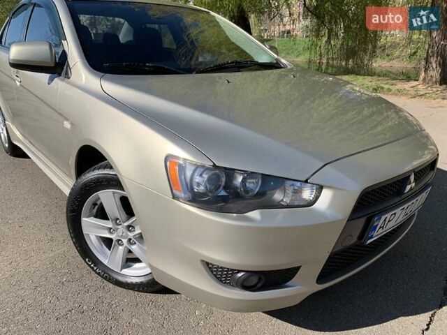 Бежевий Міцубісі Lancer, об'ємом двигуна 2 л та пробігом 175 тис. км за 7650 $, фото 16 на Automoto.ua