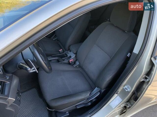Бежевий Міцубісі Lancer, об'ємом двигуна 2 л та пробігом 175 тис. км за 7650 $, фото 21 на Automoto.ua