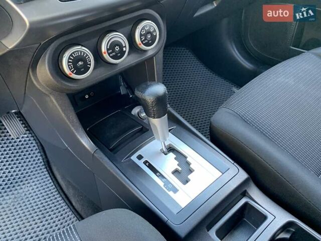 Бежевий Міцубісі Lancer, об'ємом двигуна 2 л та пробігом 175 тис. км за 7650 $, фото 27 на Automoto.ua