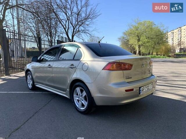 Бежевий Міцубісі Lancer, об'ємом двигуна 2 л та пробігом 175 тис. км за 7650 $, фото 18 на Automoto.ua