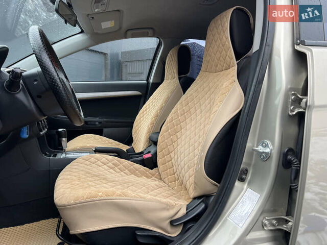 Бежевий Міцубісі Lancer, об'ємом двигуна 1.5 л та пробігом 245 тис. км за 6499 $, фото 6 на Automoto.ua