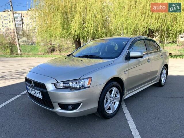 Бежевий Міцубісі Lancer, об'ємом двигуна 2 л та пробігом 175 тис. км за 7650 $, фото 17 на Automoto.ua