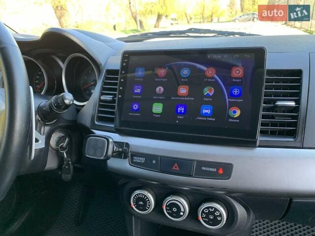 Бежевий Міцубісі Lancer, об'ємом двигуна 2 л та пробігом 175 тис. км за 7650 $, фото 26 на Automoto.ua