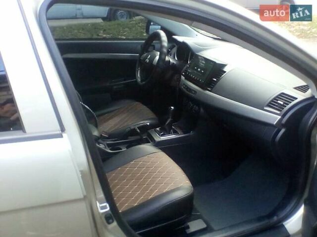 Бежевий Міцубісі Lancer, об'ємом двигуна 1.5 л та пробігом 240 тис. км за 6800 $, фото 9 на Automoto.ua