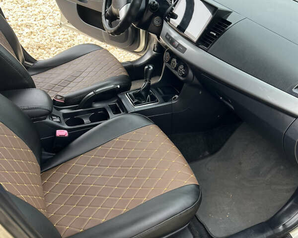 Бежевий Міцубісі Lancer, об'ємом двигуна 1.5 л та пробігом 240 тис. км за 6500 $, фото 18 на Automoto.ua
