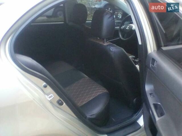 Бежевий Міцубісі Lancer, об'ємом двигуна 1.5 л та пробігом 240 тис. км за 6800 $, фото 10 на Automoto.ua
