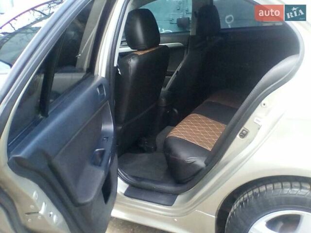 Бежевий Міцубісі Lancer, об'ємом двигуна 1.5 л та пробігом 240 тис. км за 6800 $, фото 12 на Automoto.ua