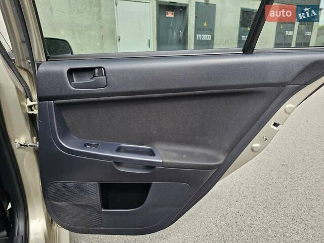Бежевий Міцубісі Lancer, об'ємом двигуна 2 л та пробігом 191 тис. км за 8200 $, фото 29 на Automoto.ua