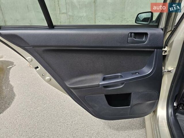 Бежевий Міцубісі Lancer, об'ємом двигуна 2 л та пробігом 191 тис. км за 8200 $, фото 31 на Automoto.ua