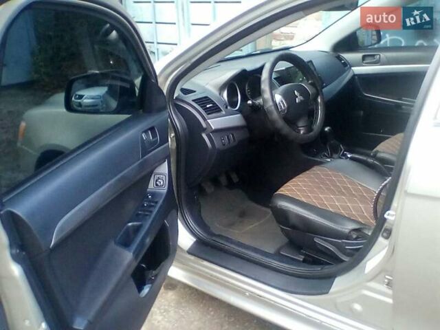 Бежевий Міцубісі Lancer, об'ємом двигуна 1.5 л та пробігом 240 тис. км за 6800 $, фото 14 на Automoto.ua