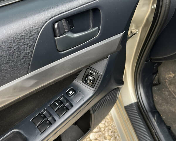Бежевий Міцубісі Lancer, об'ємом двигуна 1.5 л та пробігом 240 тис. км за 6500 $, фото 15 на Automoto.ua
