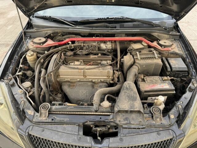 Черный Мицубиси Лансер, объемом двигателя 2 л и пробегом 3 тыс. км за 3700 $, фото 6 на Automoto.ua