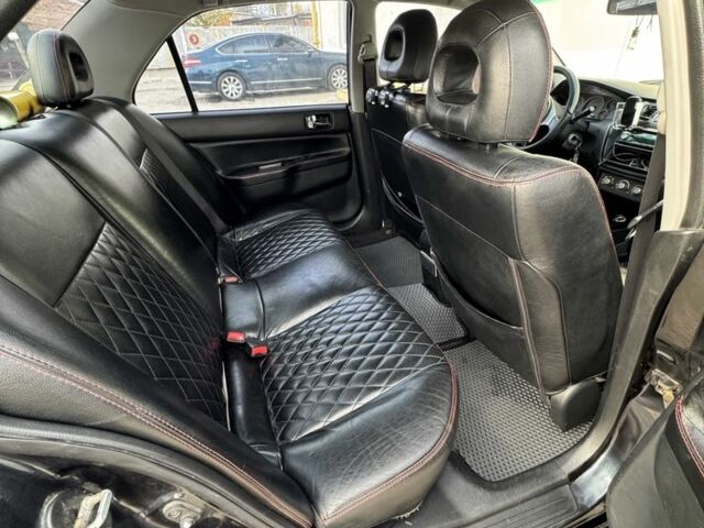 Черный Мицубиси Лансер, объемом двигателя 2 л и пробегом 3 тыс. км за 3700 $, фото 4 на Automoto.ua