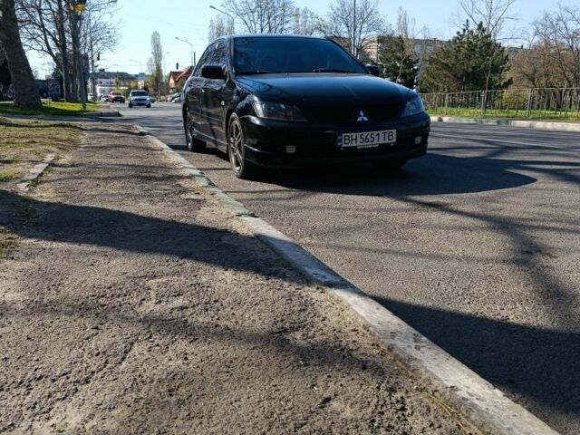 Чорний Міцубісі Lancer, об'ємом двигуна 2 л та пробігом 270 тис. км за 5000 $, фото 10 на Automoto.ua