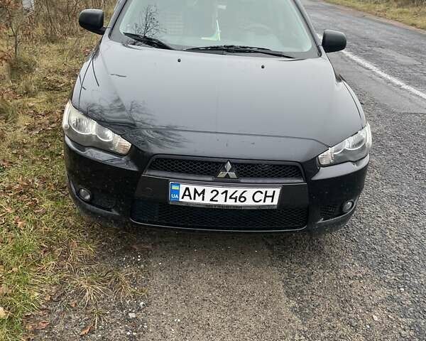 Черный Мицубиси Лансер, объемом двигателя 2 л и пробегом 260 тыс. км за 6000 $, фото 6 на Automoto.ua