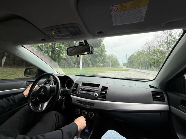 Черный Мицубиси Лансер, объемом двигателя 2 л и пробегом 190 тыс. км за 7100 $, фото 5 на Automoto.ua