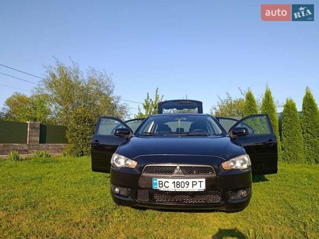Чорний Міцубісі Lancer, об'ємом двигуна 1.8 л та пробігом 188 тис. км за 6399 $, фото 31 на Automoto.ua