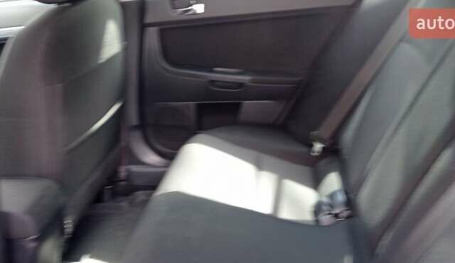 Чорний Міцубісі Lancer, об'ємом двигуна 2 л та пробігом 49 тис. км за 12500 $, фото 36 на Automoto.ua