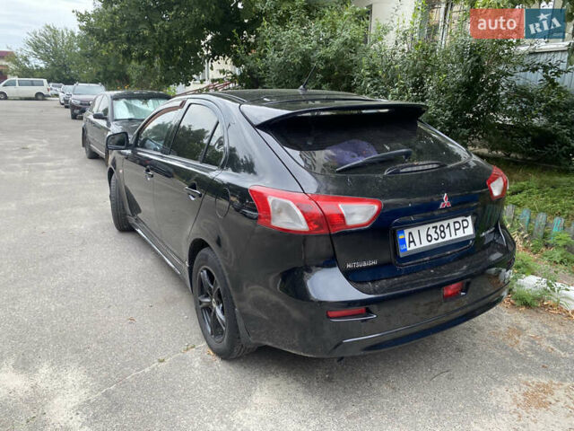 Черный Мицубиси Лансер, объемом двигателя 1.8 л и пробегом 218 тыс. км за 6800 $, фото 6 на Automoto.ua