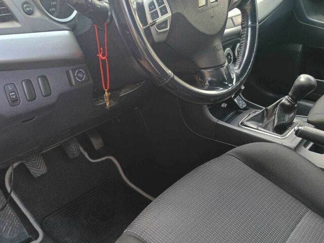 Чорний Міцубісі Lancer, об'ємом двигуна 2 л та пробігом 145 тис. км за 5200 $, фото 1 на Automoto.ua
