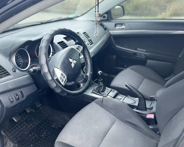 Черный Мицубиси Лансер, объемом двигателя 1.97 л и пробегом 300 тыс. км за 6800 $, фото 3 на Automoto.ua