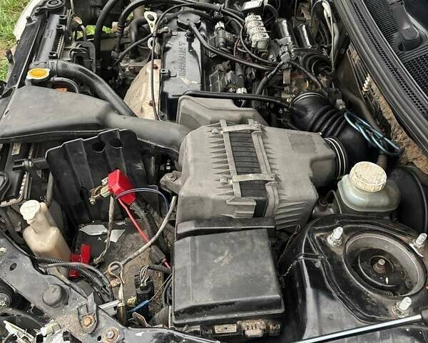 Чорний Міцубісі Lancer, об'ємом двигуна 1.6 л та пробігом 340 тис. км за 1776 $, фото 7 на Automoto.ua