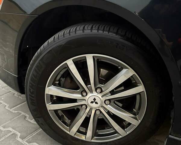 Чорний Міцубісі Lancer, об'ємом двигуна 1.8 л та пробігом 330 тис. км за 7000 $, фото 7 на Automoto.ua