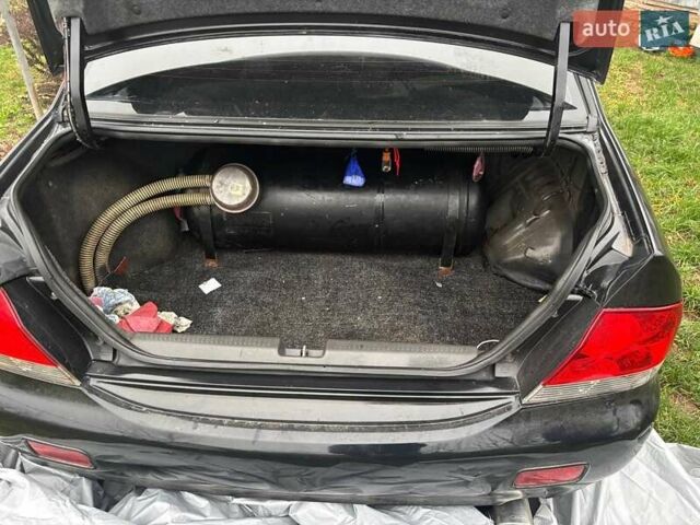 Чорний Міцубісі Lancer, об'ємом двигуна 1.6 л та пробігом 340 тис. км за 1776 $, фото 6 на Automoto.ua