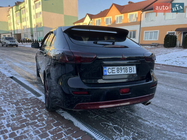 Чорний Міцубісі Lancer, об'ємом двигуна 1.8 л та пробігом 138 тис. км за 6777 $, фото 17 на Automoto.ua