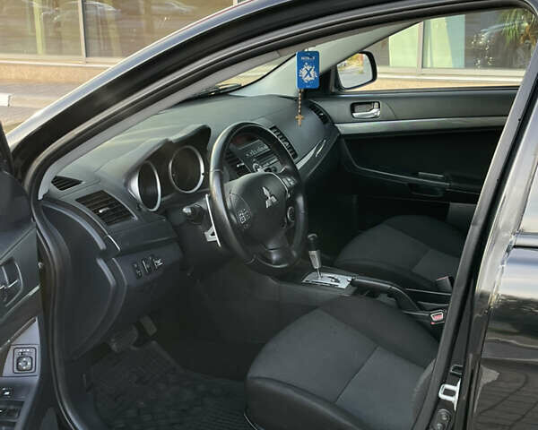 Чорний Міцубісі Lancer, об'ємом двигуна 1.8 л та пробігом 280 тис. км за 5900 $, фото 10 на Automoto.ua