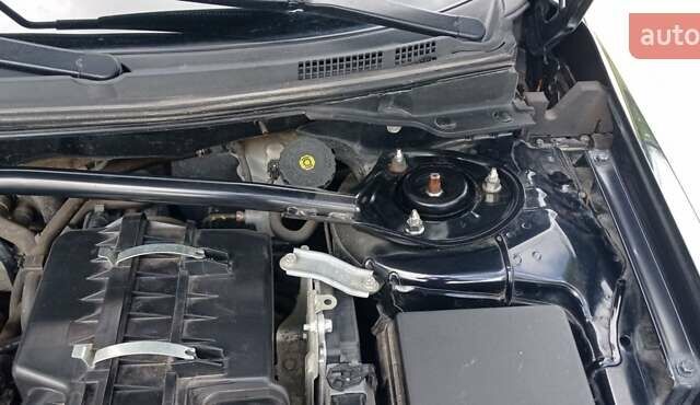 Чорний Міцубісі Lancer, об'ємом двигуна 2 л та пробігом 49 тис. км за 12500 $, фото 16 на Automoto.ua