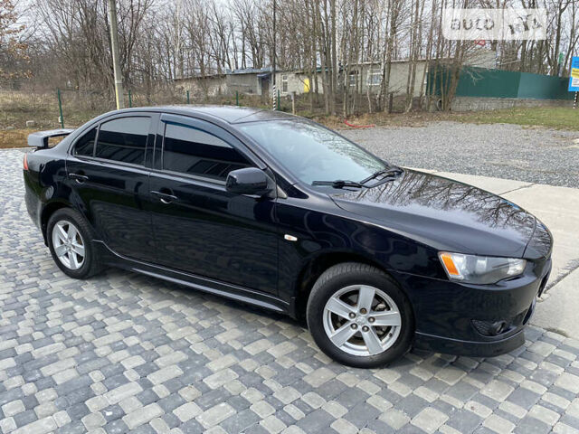 Чорний Міцубісі Lancer, об'ємом двигуна 2 л та пробігом 170 тис. км за 6999 $, фото 9 на Automoto.ua