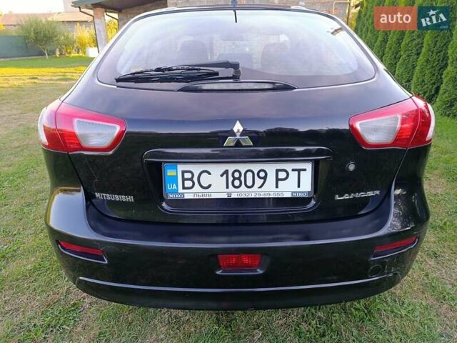 Чорний Міцубісі Lancer, об'ємом двигуна 1.8 л та пробігом 188 тис. км за 6399 $, фото 16 на Automoto.ua
