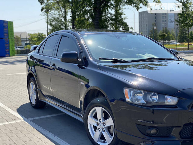 Чорний Міцубісі Lancer, об'ємом двигуна 2 л та пробігом 170 тис. км за 7000 $, фото 13 на Automoto.ua