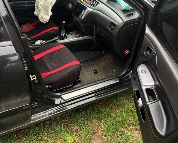 Чорний Міцубісі Lancer, об'ємом двигуна 1.6 л та пробігом 340 тис. км за 1776 $, фото 8 на Automoto.ua