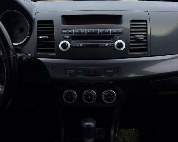 Чорний Міцубісі Lancer, об'ємом двигуна 1.8 л та пробігом 330 тис. км за 7000 $, фото 3 на Automoto.ua
