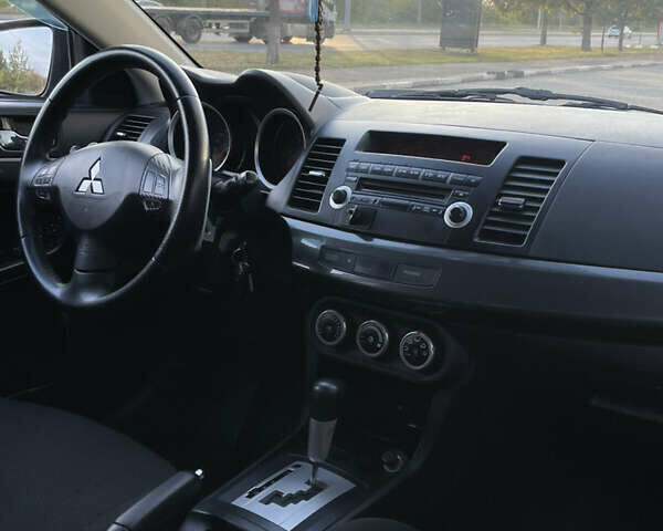 Чорний Міцубісі Lancer, об'ємом двигуна 1.8 л та пробігом 280 тис. км за 5900 $, фото 13 на Automoto.ua