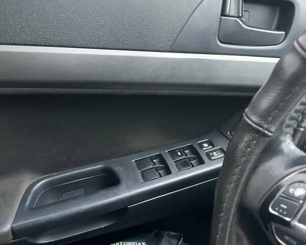 Черный Мицубиси Лансер, объемом двигателя 2 л и пробегом 260 тыс. км за 6000 $, фото 1 на Automoto.ua