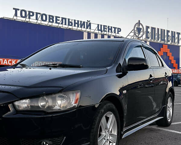Чорний Міцубісі Lancer, об'ємом двигуна 1.8 л та пробігом 280 тис. км за 6800 $, фото 6 на Automoto.ua